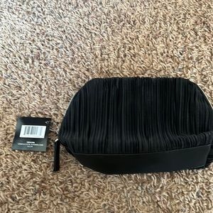 Make-up bag. Good for travel. Never used.